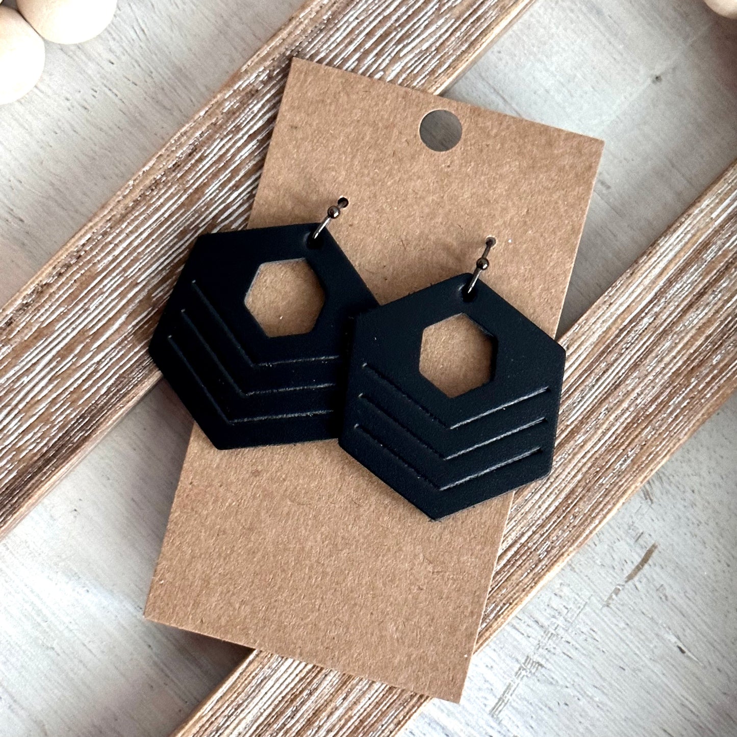 Smooth Black Embossed Hexagon